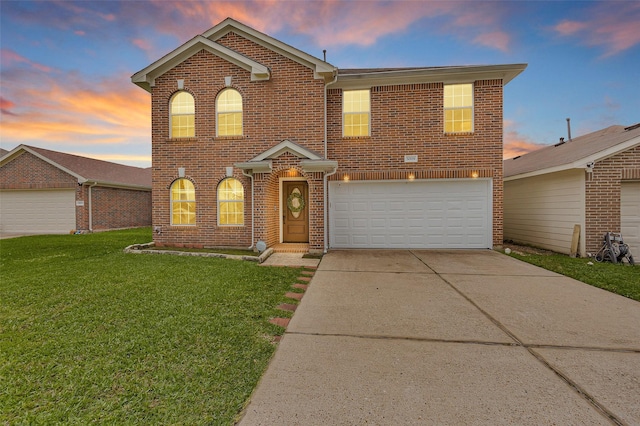 5009 Deerpath Dr, Conroe, TX 77303 - traditional-style home featuring brick siding, a garage, a front lawn, and concrete driveway