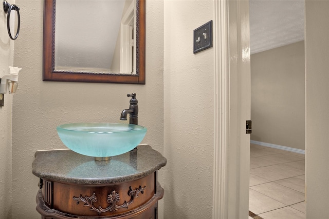 5009 Deerpath Dr, Conroe, TX 77303 - bathroom featuring a sink and tile patterned floors