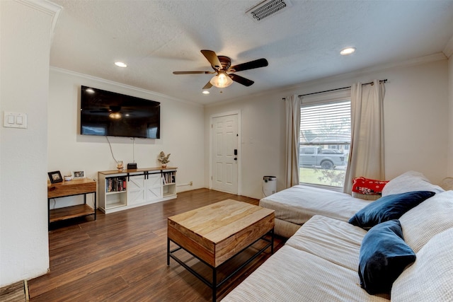 708 Gresham St, Baytown, TX 77520 - living room featuring ceiling fan, visible vents, wood finished floors, ornamental molding, and recessed lighting