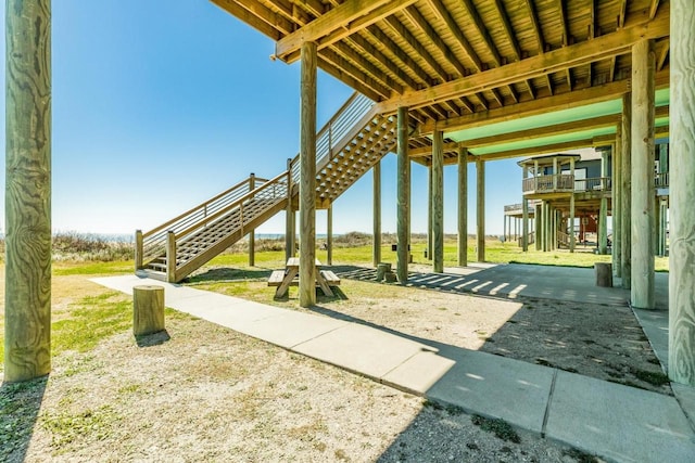 2386 Hwy 87, Gilchrist, TX 77617 - view of patio with stairs