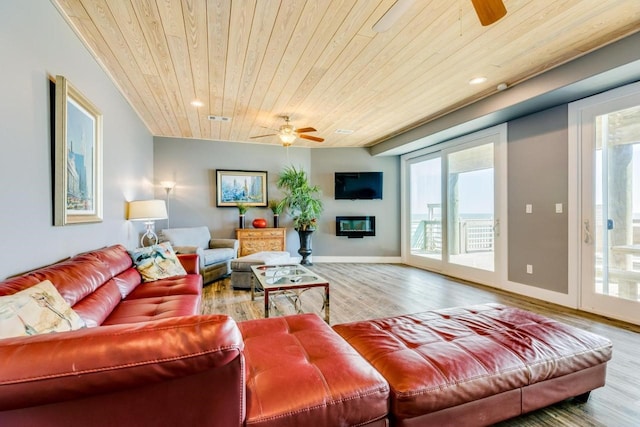 2386 Hwy 87, Gilchrist, TX 77617 - living room with wood ceiling, ceiling fan, recessed lighting, and wood finished floors