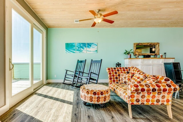 2386 Hwy 87, Gilchrist, TX 77617 - interior space featuring baseboards, ceiling fan, wooden ceiling, and wood finished floors