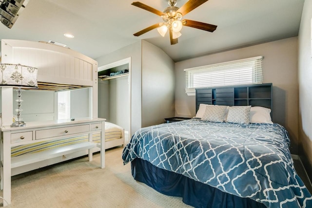2386 Hwy 87, Gilchrist, TX 77617 - carpeted bedroom featuring a closet, a ceiling fan, lofted ceiling, and recessed lighting