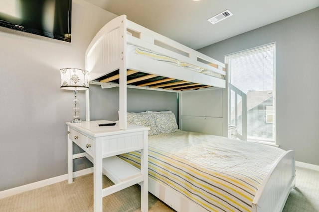 2386 Hwy 87, Gilchrist, TX 77617 - bedroom featuring baseboards, multiple windows, and carpet