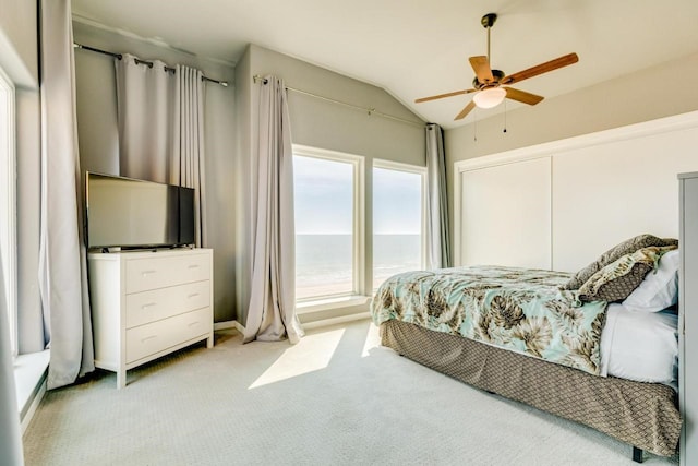 2386 Hwy 87, Gilchrist, TX 77617 - carpeted bedroom featuring ceiling fan and vaulted ceiling