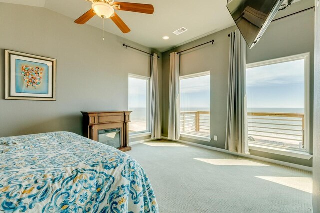 2386 Hwy 87, Gilchrist, TX 77617 - bedroom with visible vents, carpet, and ceiling fan