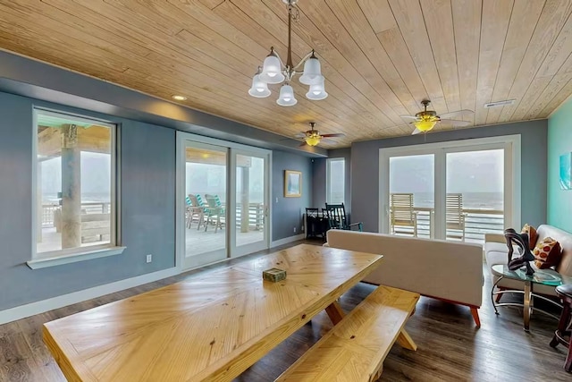 2386 Hwy 87, Gilchrist, TX 77617 - dining space featuring a notable chandelier, plenty of natural light, and wood ceiling