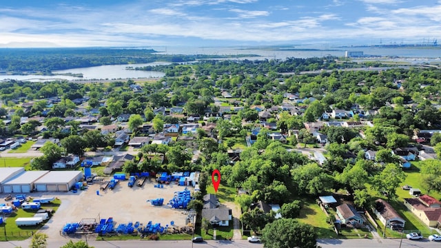 bird's eye view with a water view and a residential view
