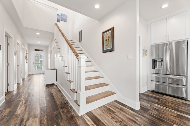 stairs featuring baseboards, recessed lighting, and wood finished floors