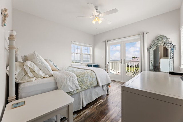 bedroom with access to outside, a ceiling fan, and dark wood-style floors