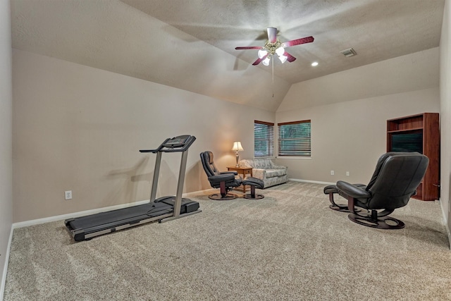 workout room with carpet, a ceiling fan, baseboards, and vaulted ceiling
