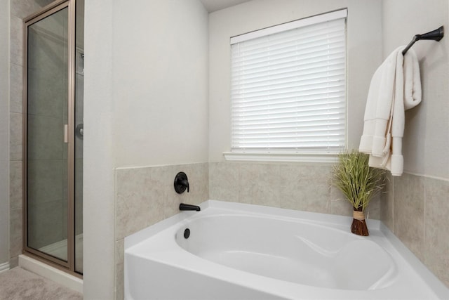 15502 Bosque Valley Ct, Cypress, TX 77433 - bathroom featuring a garden tub and a shower stall