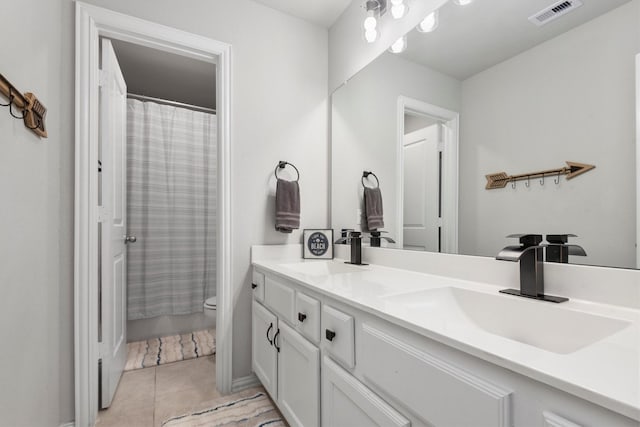 15502 Bosque Valley Ct, Cypress, TX 77433 - full bath with double vanity, toilet, visible vents, and a sink