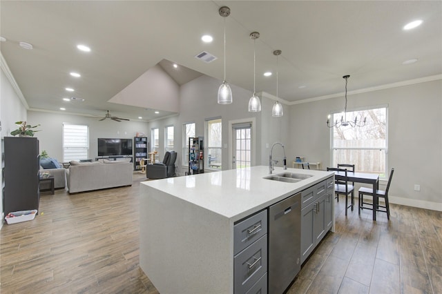 14514 Sanour Dr, Houston, TX 77084 - kitchen featuring stainless steel dishwasher, visible vents, a sink, ceiling fan with notable chandelier, and gray cabinetry