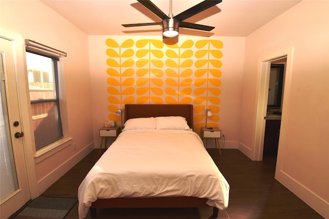 3804 Lovejoy St, Houston, TX 77003 - bedroom featuring dark wood-style flooring, baseboards, and a ceiling fan