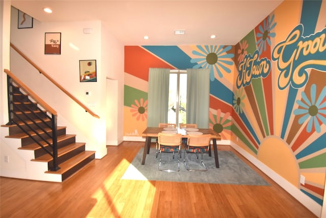 3804 Lovejoy St, Houston, TX 77003 - dining room featuring recessed lighting, baseboards, stairs, and wood finished floors
