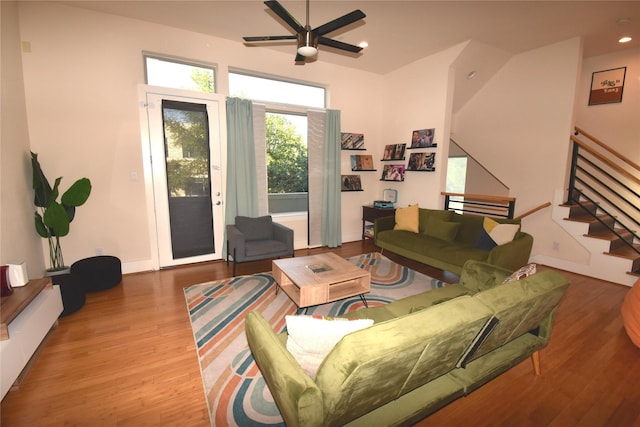 3804 Lovejoy St, Houston, TX 77003 - living room with stairway, a ceiling fan, recessed lighting, and wood finished floors
