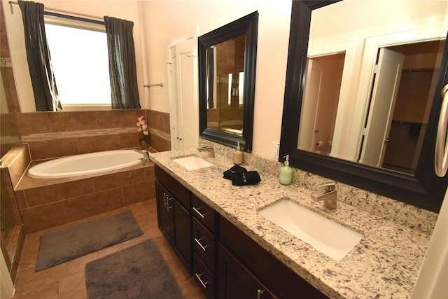 3804 Lovejoy St, Houston, TX 77003 - full bath featuring double vanity, tile patterned floors, a sink, and a bath