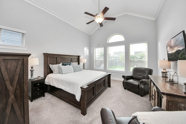 bedroom featuring light carpet, high vaulted ceiling, a ceiling fan, crown molding, and baseboards