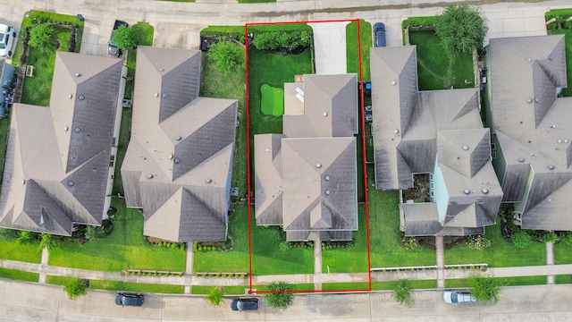 aerial view of residential area with property parcel outlined
