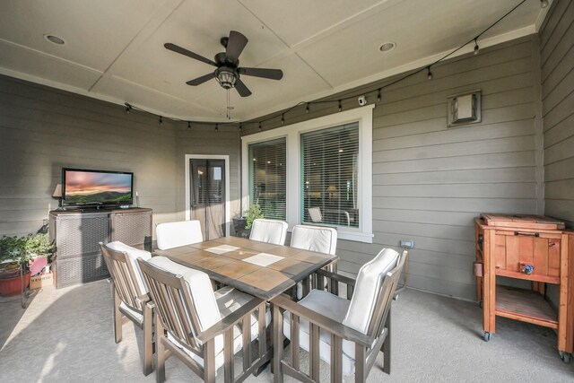view of patio with ceiling fan and outdoor dining space