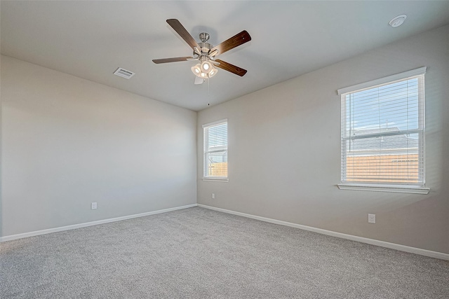 10103 Gold Finch Run, Magnolia, TX 77354 - unfurnished room with carpet flooring, ceiling fan, visible vents, and baseboards
