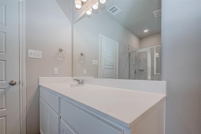 10103 Gold Finch Run, Magnolia, TX 77354 - full bathroom featuring vanity, recessed lighting, visible vents, and a stall shower