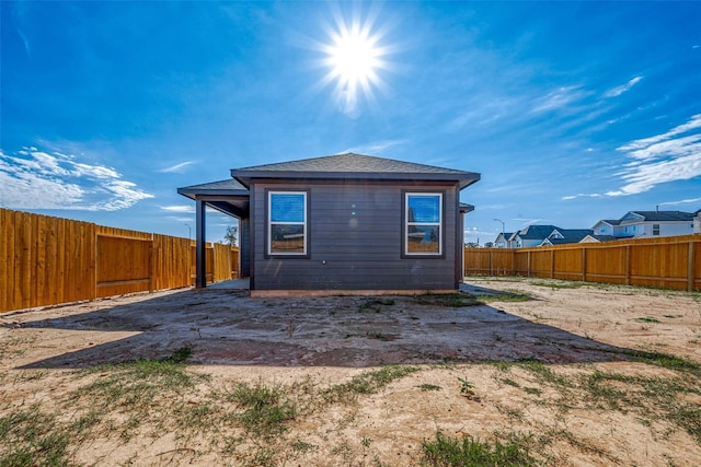 10103 Gold Finch Run, Magnolia, TX 77354 - rear view of property featuring a fenced backyard and roof with shingles