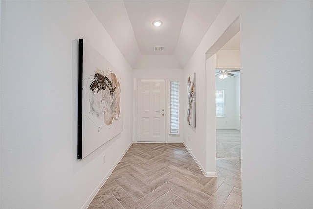 26234 Cooperstown Way, Splendora, TX 77372 - hallway with visible vents, baseboards, and vaulted ceiling