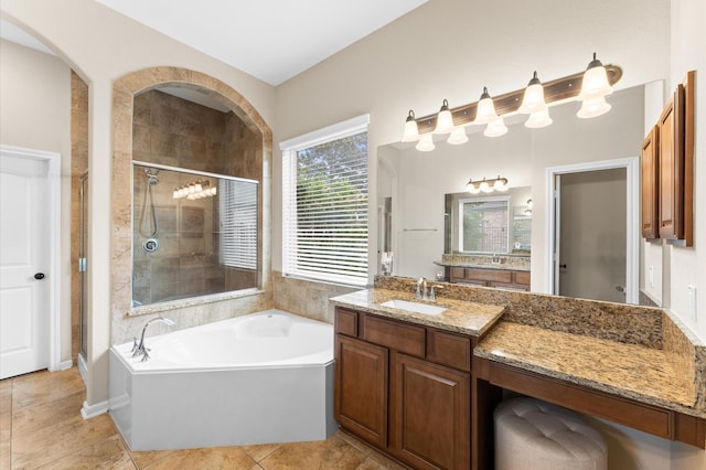 full bath featuring vanity, a stall shower, tile patterned floors, and a bath