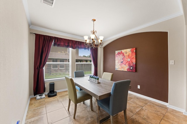 dining room featuring visible vents, ornamental molding, baseboards, and a notable chandelier