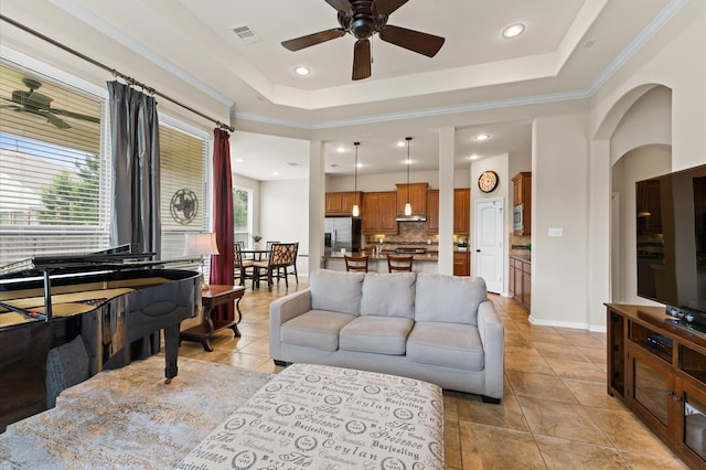 living room featuring light tile patterned floors, ceiling fan, recessed lighting, and visible vents