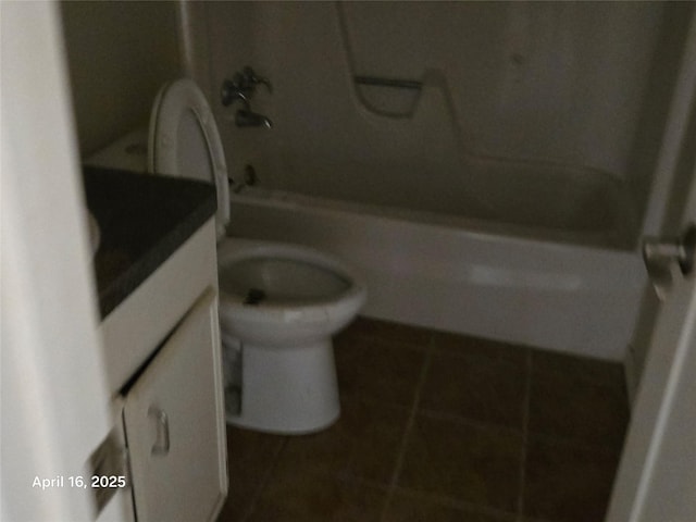 full bath featuring tile patterned flooring, shower / tub combination, toilet, and vanity