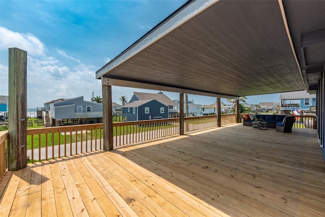 12928 John Reynolds Rd, Galveston, TX 77554 - wooden deck with a yard, outdoor lounge area, and a residential view