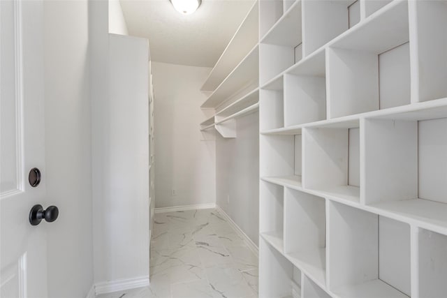 12928 John Reynolds Rd, Galveston, TX 77554 - spacious closet with marble finish floor