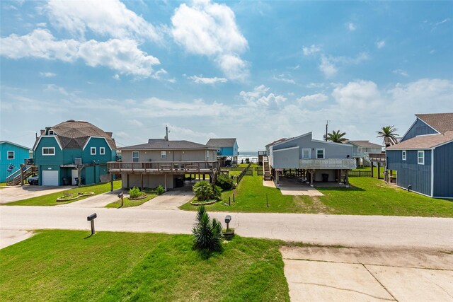 12928 John Reynolds Rd, Galveston, TX 77554 - exterior space with stairway and a residential view