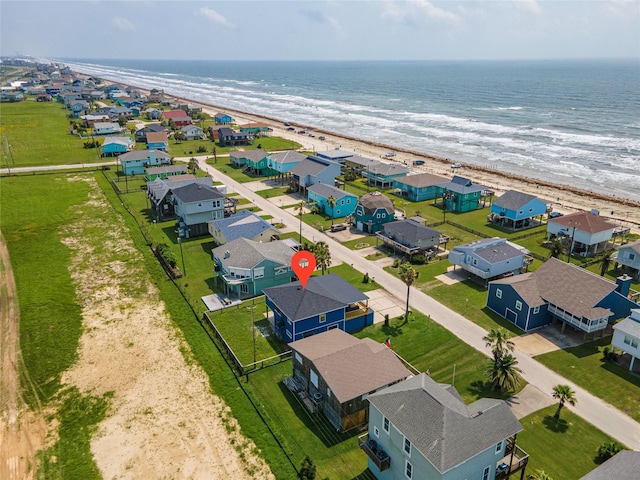 12928 John Reynolds Rd, Galveston, TX 77554 - drone / aerial view with a water view, a beach view, and a residential view