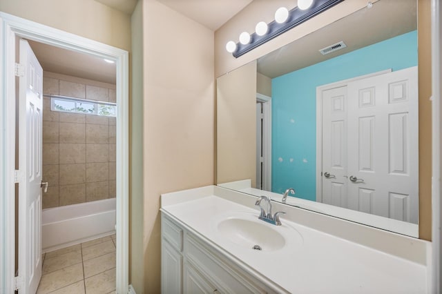 3011 Rustic Gardens Dr, Spring, TX 77386 - full bathroom featuring vanity, tile patterned floors, and washtub / shower combination