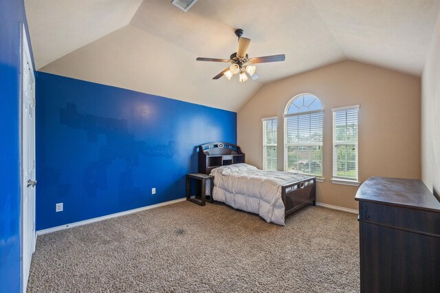 3011 Rustic Gardens Dr, Spring, TX 77386 - carpeted bedroom with vaulted ceiling, baseboards, and a ceiling fan
