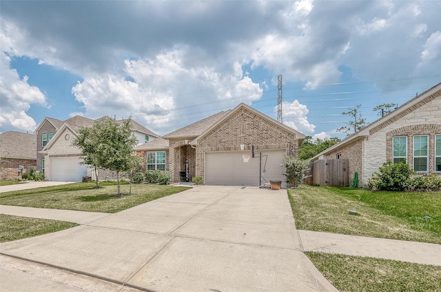 view of front of house featuring an attached garage, a front yard, driveway, and brick siding