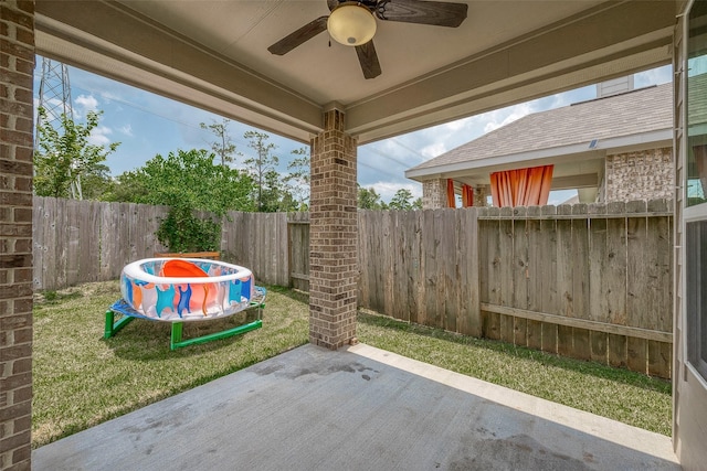 view of patio featuring a ceiling fan and a fenced backyard