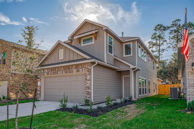 27083 Badger Way, Magnolia, TX 77354 - craftsman-style home with board and batten siding, a garage, central AC, fence, and a front lawn