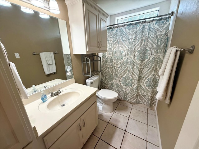 full bathroom with vanity, tile patterned flooring, toilet, and a shower with curtain