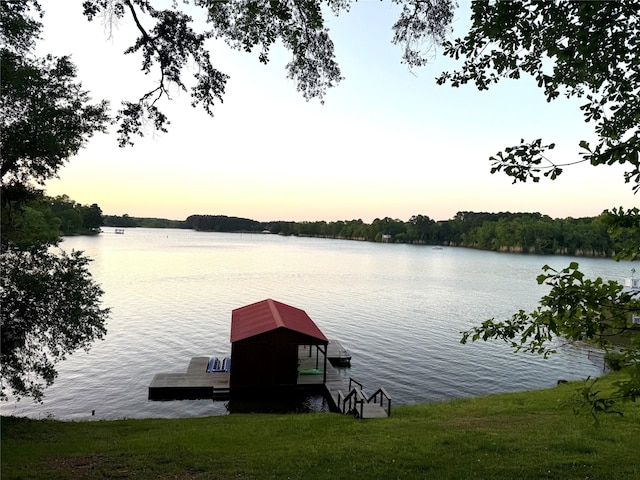 dock area featuring a water view