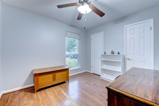 4114 Cicada Ln, Houston, TX 77039 - office area featuring baseboards, a ceiling fan, and light wood finished floors