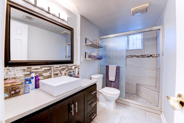 4114 Cicada Ln, Houston, TX 77039 - full bath featuring backsplash, visible vents, a shower stall, vanity, and toilet