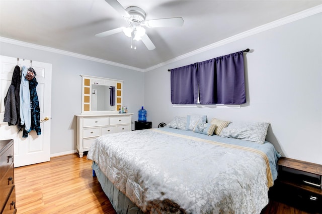 4114 Cicada Ln, Houston, TX 77039 - bedroom with baseboards, ornamental molding, a ceiling fan, and light wood-style flooring