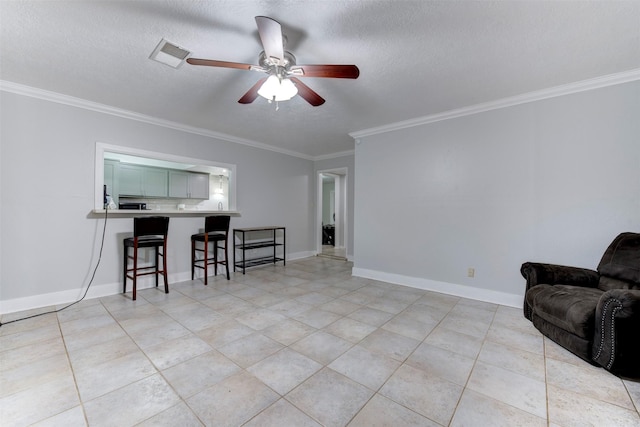4114 Cicada Ln, Houston, TX 77039 - living room featuring crown molding, visible vents, light tile patterned flooring, a textured ceiling, and a ceiling fan