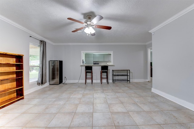 4114 Cicada Ln, Houston, TX 77039 - unfurnished living room with crown molding, a ceiling fan, a textured ceiling, and light tile patterned flooring