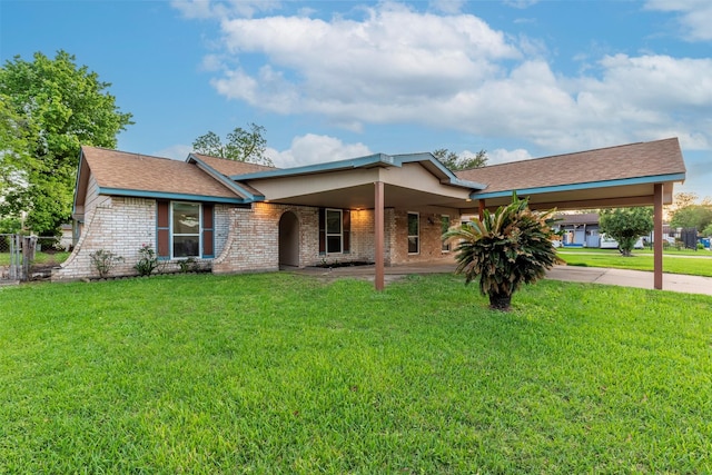 4114 Cicada Ln, Houston, TX 77039 - ranch-style house featuring brick siding, a front yard, and a carport